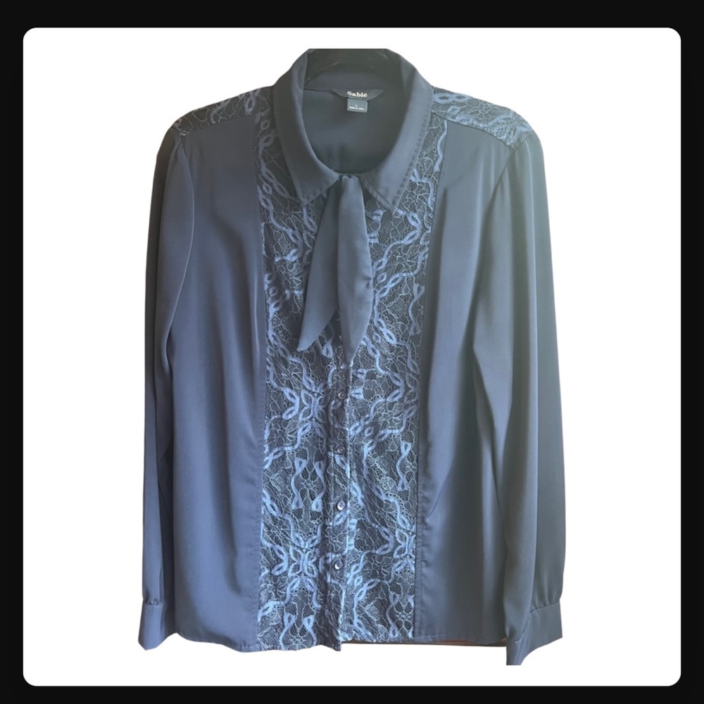 Pretty navy blue button up blouse with lace details and tie. Size large.